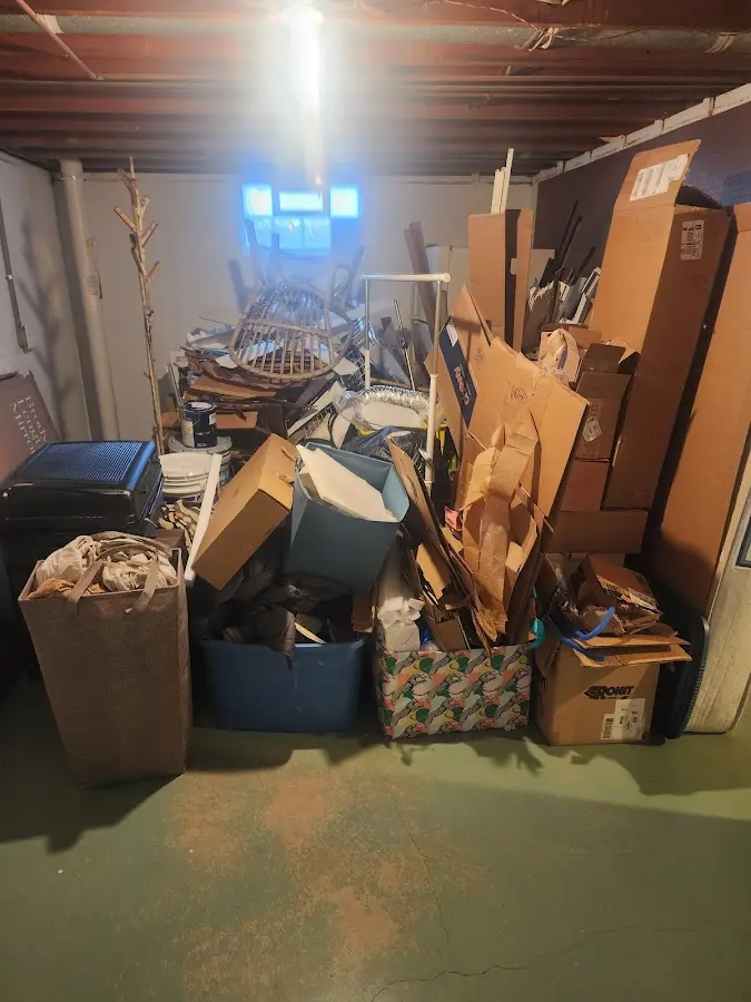 Roll-off dumpster container at job site for Yard Waste Dumpster Rental in Sparta